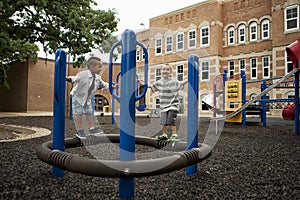 Boys Playing On A Playground