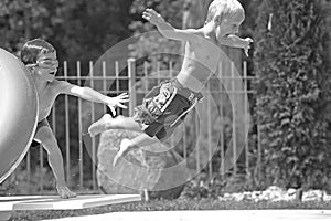 Boys Playing in the Pool