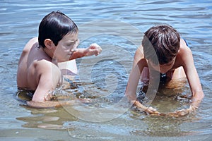 Boys playing in water