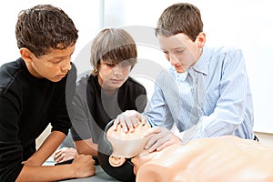 Boys Practicing CPR photo
