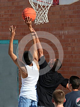 Boys Reaching for Basket