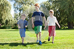 Boys running in park