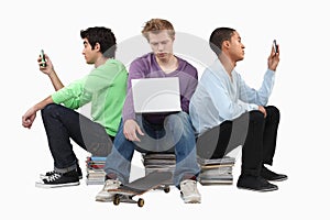 Boys sitting on books