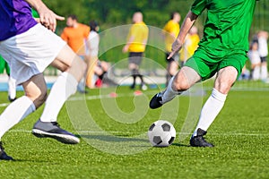 Boys Soccer Football Game on the Pitch