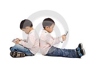Boys using touchscreen tablet PC