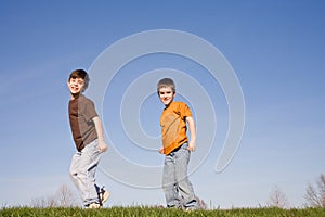 Boys Walking on a Hill