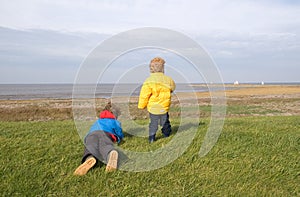 Boys watching sailing ships