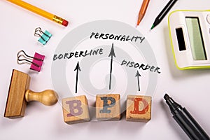 BPD - Borderline Personality Disorder. Wooden blocks on a white office table