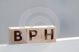 BPH Benign Prostatic Hyperplasia acronym on wooden background