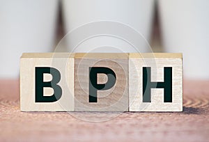 BPH Benign Prostatic Hyperplasia acronym on wooden background