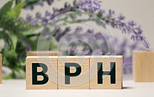 BPH Benign Prostatic Hyperplasia acronym on wooden background