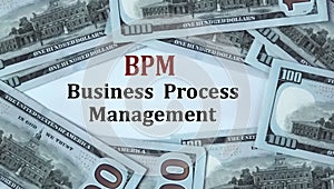 BPM - acronym on the background of cash dollar bills