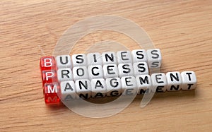 BPM business process management on wood photo