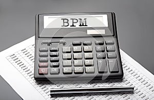 BPM word on the calculator on the chart with pen