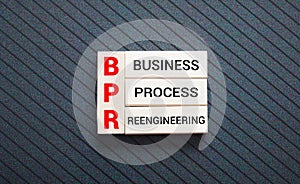 BPR - Business process reengineering - acronym on wooden cubes.
