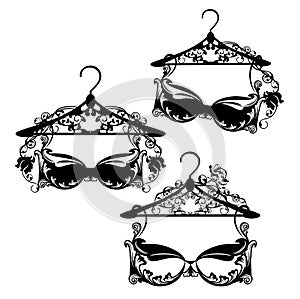 Bra lingerie and hanger with rose flowers black and white vector design set