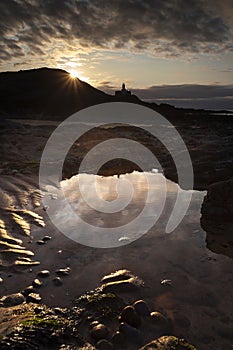 Bracelet Bay and Mumbles lighthouse sunrise