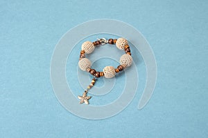 Bracelet handmade crochet and wooden beads and starfish pendant