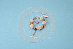 Bracelet handmade wooden and crochet beads and starfish pendant