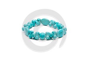 Bracelet from turquoise stone isolated on a white