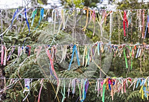 Bracelets with religious messages and rosaries on the route of pilgrimage the Path of Faith, Minas Gerais, Brazil.