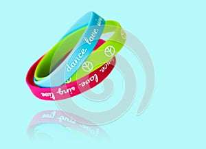 Bracelets with the symbol of peace on a blue background