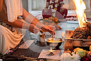 Brahman makes a Hindu the Vedic Yagya ceremony. Indian Hindu Traditional Pooja. Vedic fire ceremony called Yagya. Indian wedding