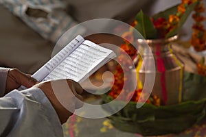 Brahman reading hindu mantra in Barrdia, Nepal photo