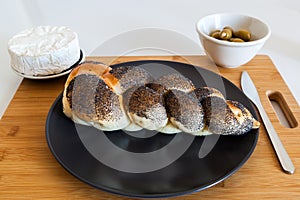 Braided bread with olives and cheese