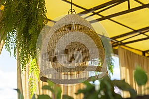 Braided thread lampshade for lamp. Lamp in kafe