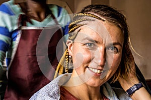 Braiding in hairdresser salon in Kenya