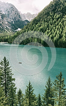 BRAIES LAKE, DOLOMITES, ITALY, 28 MAY, 2023: Tourists at Lago di Braies in the Dolomites, northern Italy, Europe