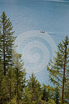 BRAIES LAKE, DOLOMITES, ITALY, 28 MAY, 2023: Tourists at Lago di Braies in the Dolomites, northern Italy, Europe