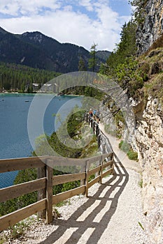 BRAIES LAKE, DOLOMITES, ITALY, 28 MAY, 2023: Tourists at Lago di Braies in the Dolomites, northern Italy, Europe