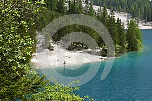 Braies lake seen from the path that surrounds Lake Braies. Dolomites, northern Italy, Europe