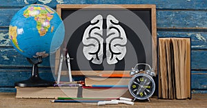 brain on blackboard with study objects