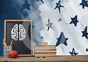 Brain Desk foreground with blackboard graphics of stars