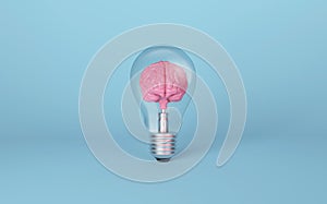 Brain on light bulb on blue background. Concept of inspiration, creativity, idea, innovation