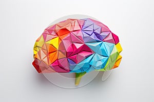 Brain shape made of origami paper with different colors areas. neurodiversity concept