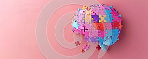 Brain-shaped assembly constructed from multicolored jigsaw puzzle pieces photo
