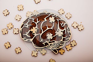 Brain with wooden puzzles. Mental Health and problems with memory