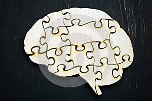 Brain from wooden puzzles. Mindfulness concept