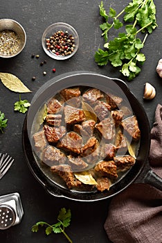 Braised beef in cast iron skillet