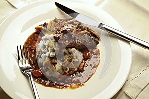 Braised beef cheeks with mushrooms and mashed purple potatoes