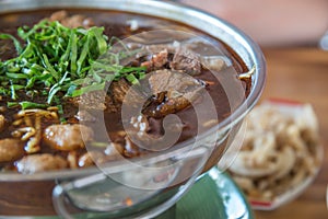 Braised beef clear with meat tendon ball soup stew