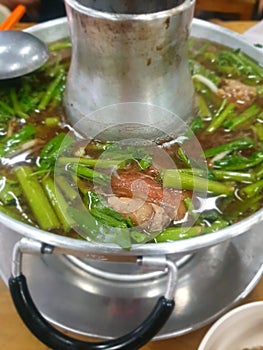 Braised beef clear with meat tendon soup stew