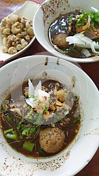 Braised beef clear noodle with meat ball soup stew