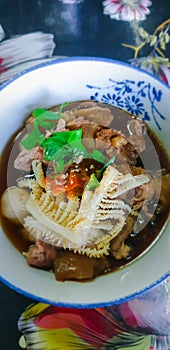 Braised beef clear noodle with meat ball soup stew