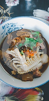 Braised beef clear noodle with meat ball soup stew