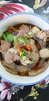 Braised beef clear noodle with meat ball soup stew